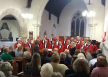 The choir in their red jackets.